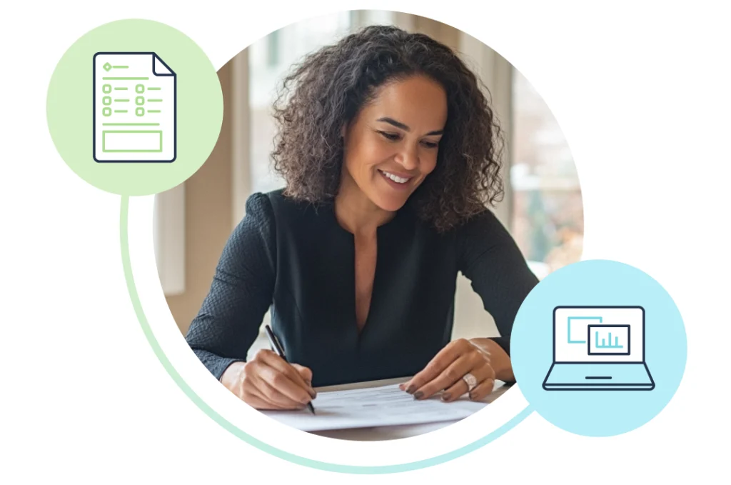 woman completing paper based survey at home