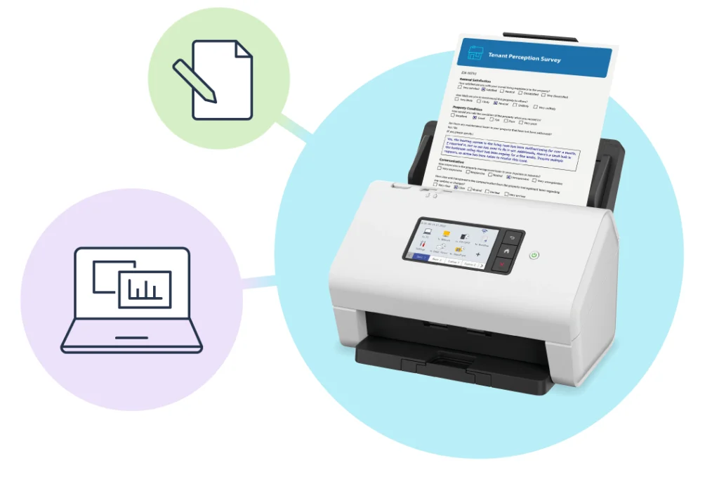 Document scanner with completed paper based survey inserted for scanning.